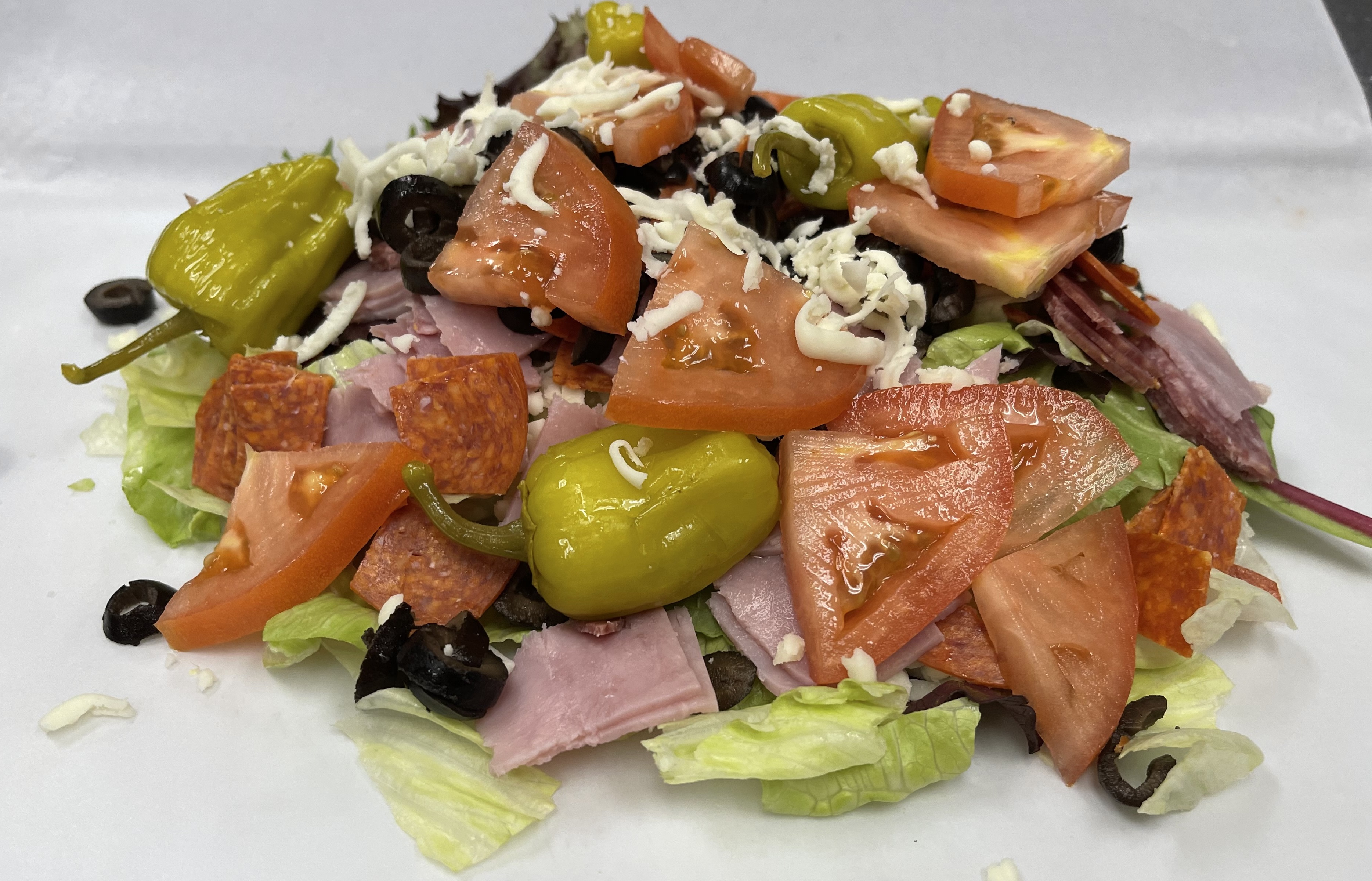 Order Regular Size Antipasto Salad food online from Ameci Pizza & Pasta store, Thousand Oaks on bringmethat.com