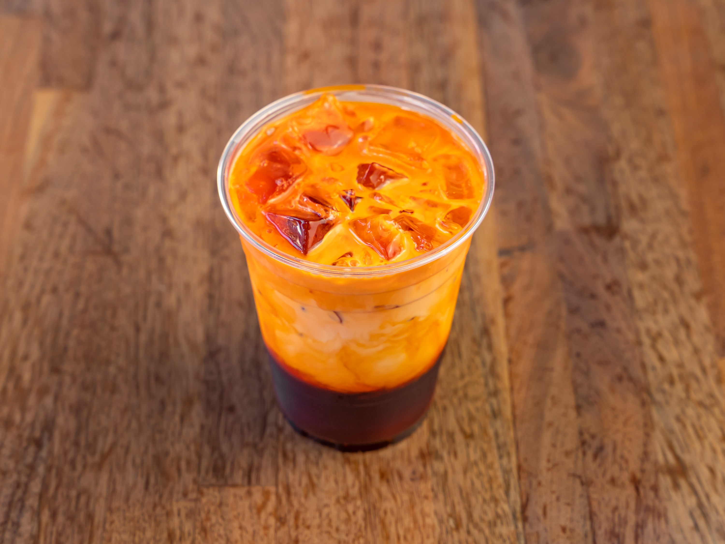 Order Thai Iced Tea food online from Jo Jo's Cafe store, San Francisco on bringmethat.com
