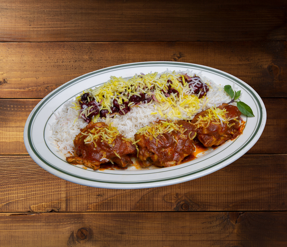 Order 68. Albaloo Polo with Chicken - آلبالو پلو با مرغ food online from Negeen Restaurant store, Campbell on bringmethat.com