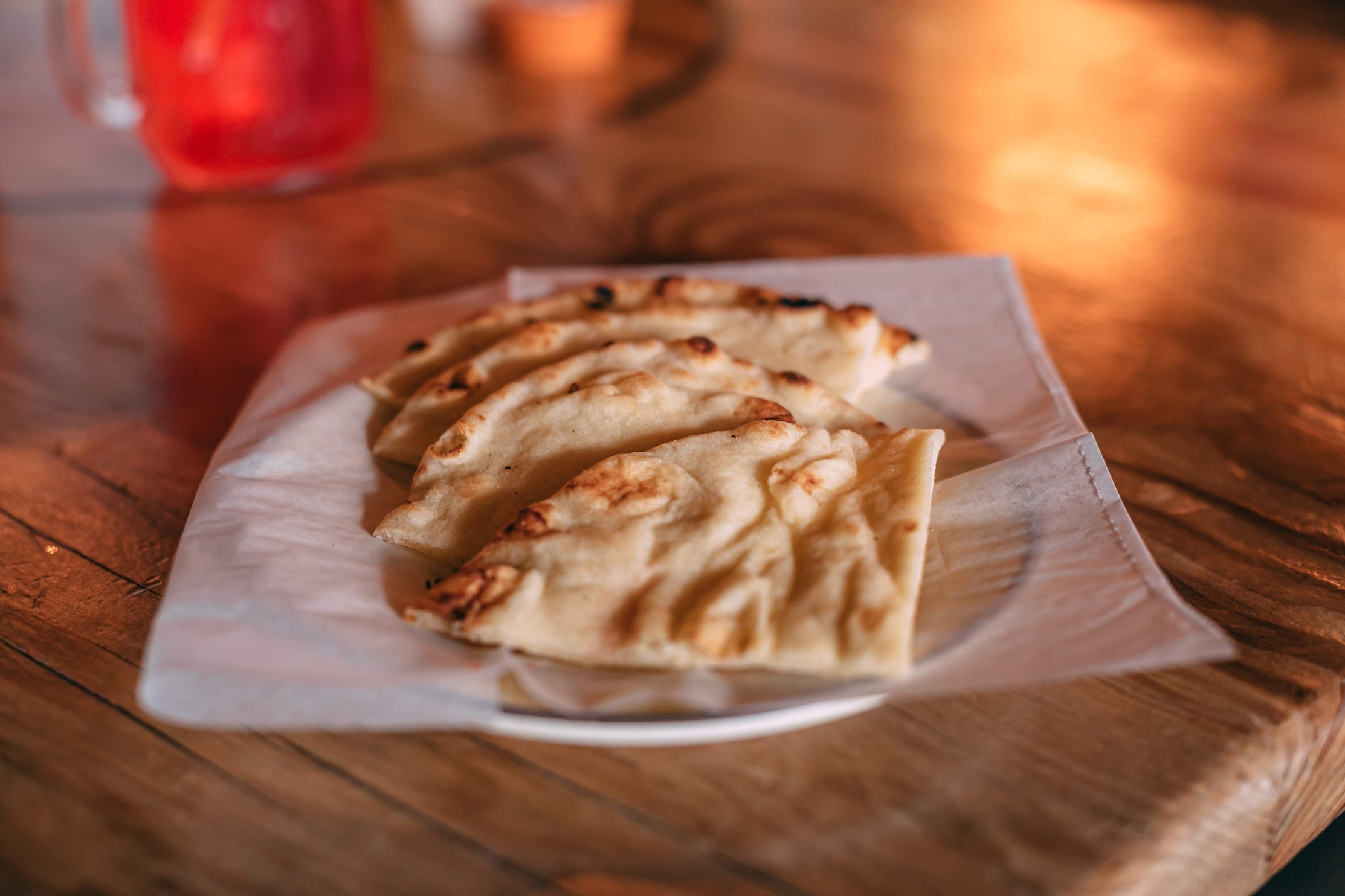 Order *Toasted Pita food online from Port Of Peri Peri store, Buffalo Grove on bringmethat.com