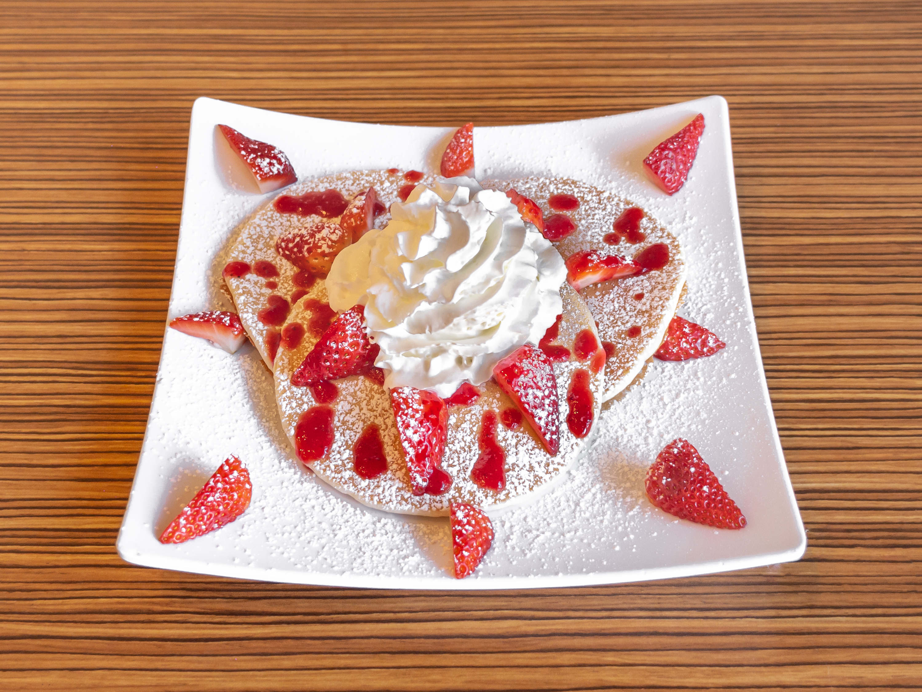 Order Strawberry Pancakes food online from Mimosas Of Willow Glen store, San Jose on bringmethat.com