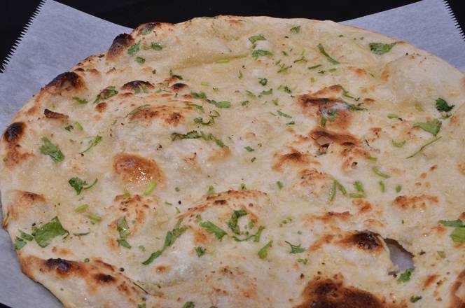 Order Garlic Naan food online from Deccan spice store, Jersey City on bringmethat.com
