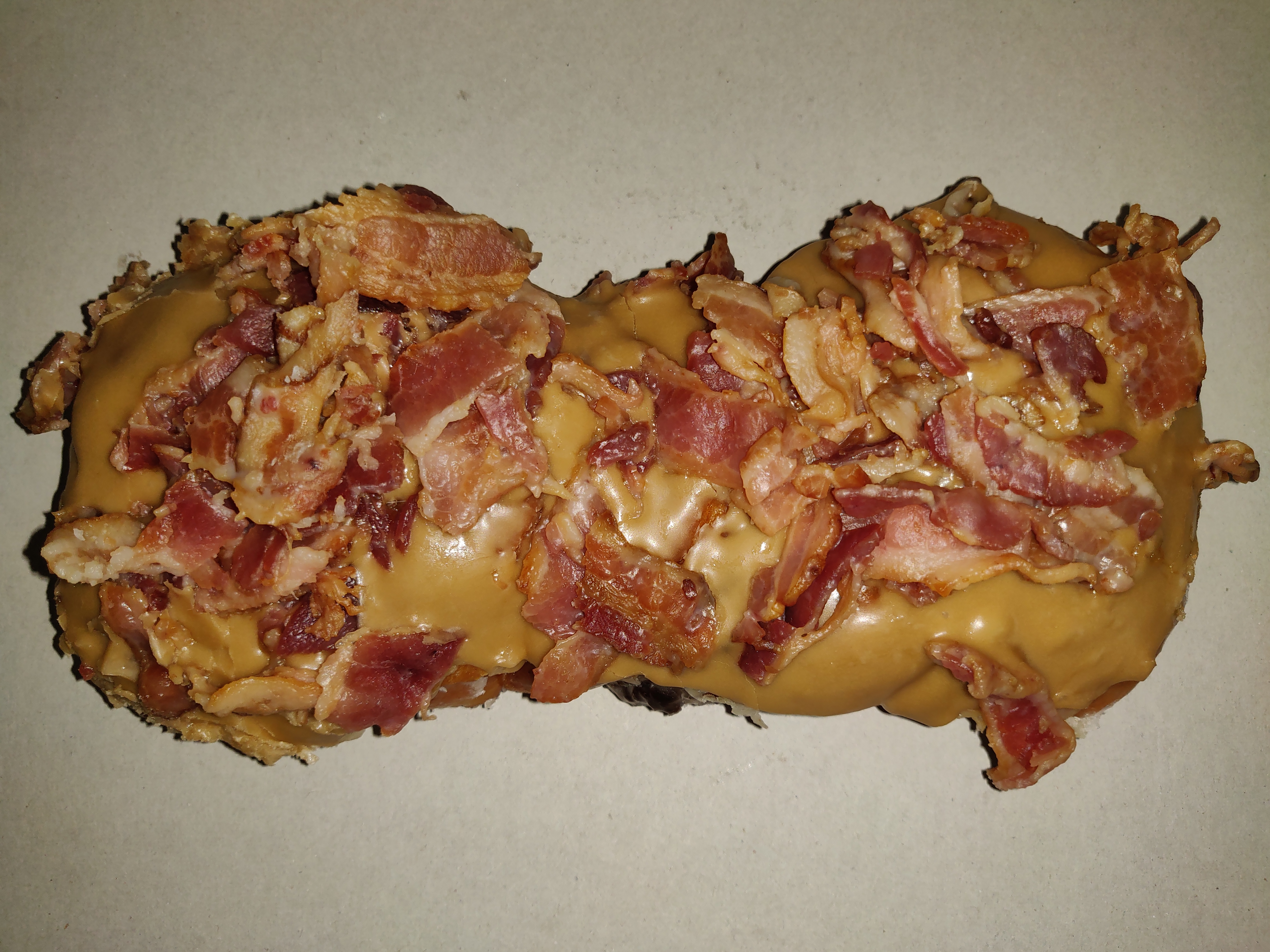 Order (Club Special) Maple Bacon Tiger Tail food online from Donut Club store, San Dimas on bringmethat.com