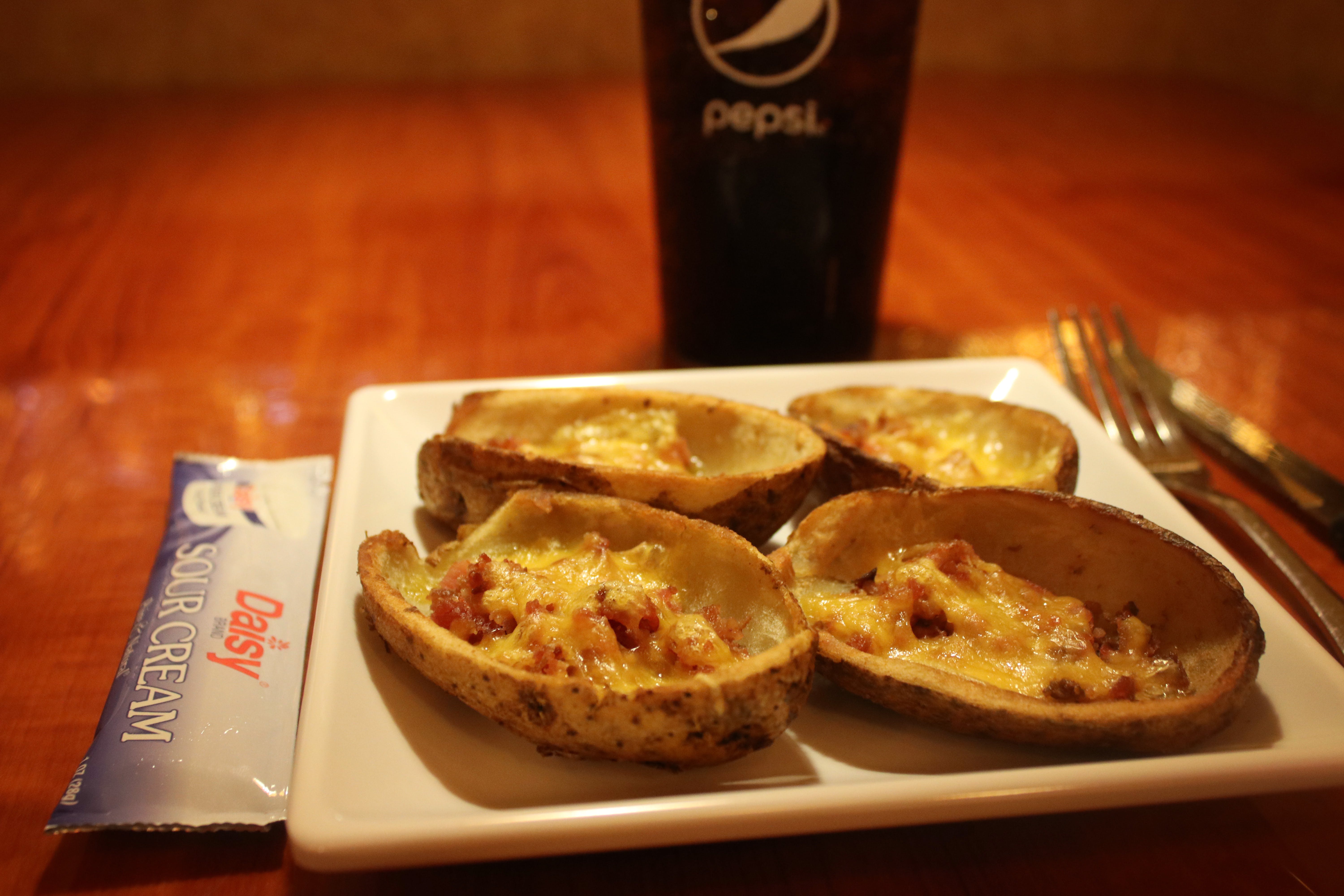 Order Potato Skins with Cheese - Appetizer food online from Amore Pizza King store, Rockville on bringmethat.com