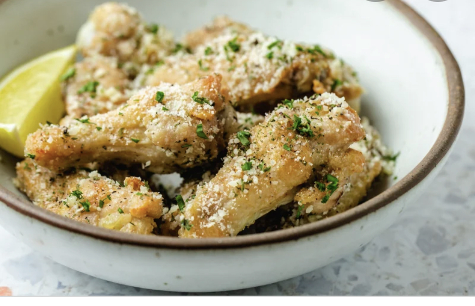 Order Garlic Parmesan Wings food online from Milano Pizza store, Tracy on bringmethat.com