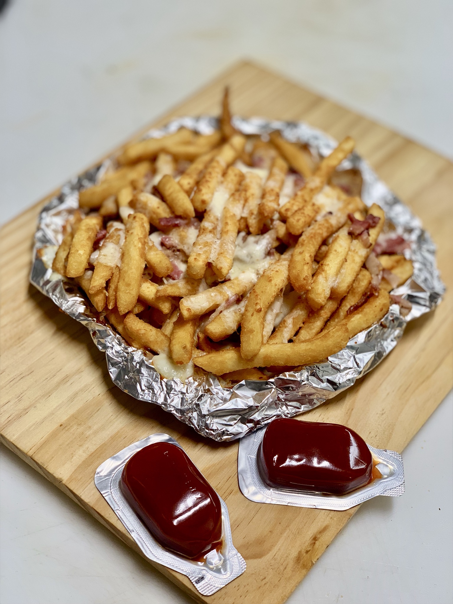 Order French Fries with Cheese and Bacon food online from Pizza Bella Monte store, Pittsburgh on bringmethat.com
