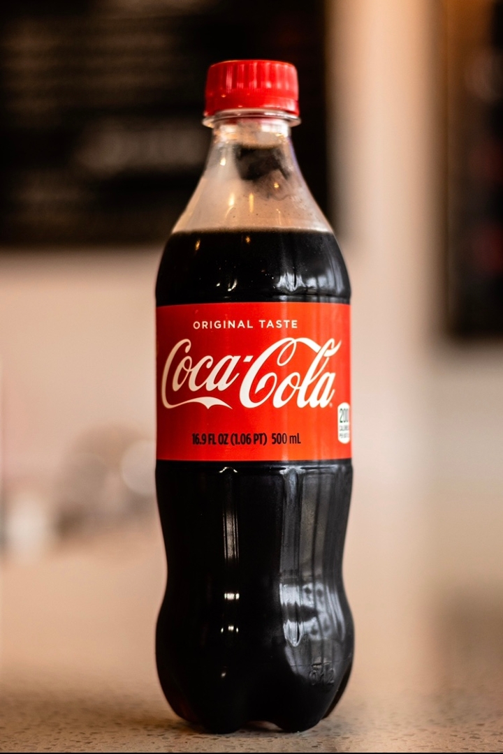 Order COKE food online from Daddyo's Pizza store, Houston on bringmethat.com