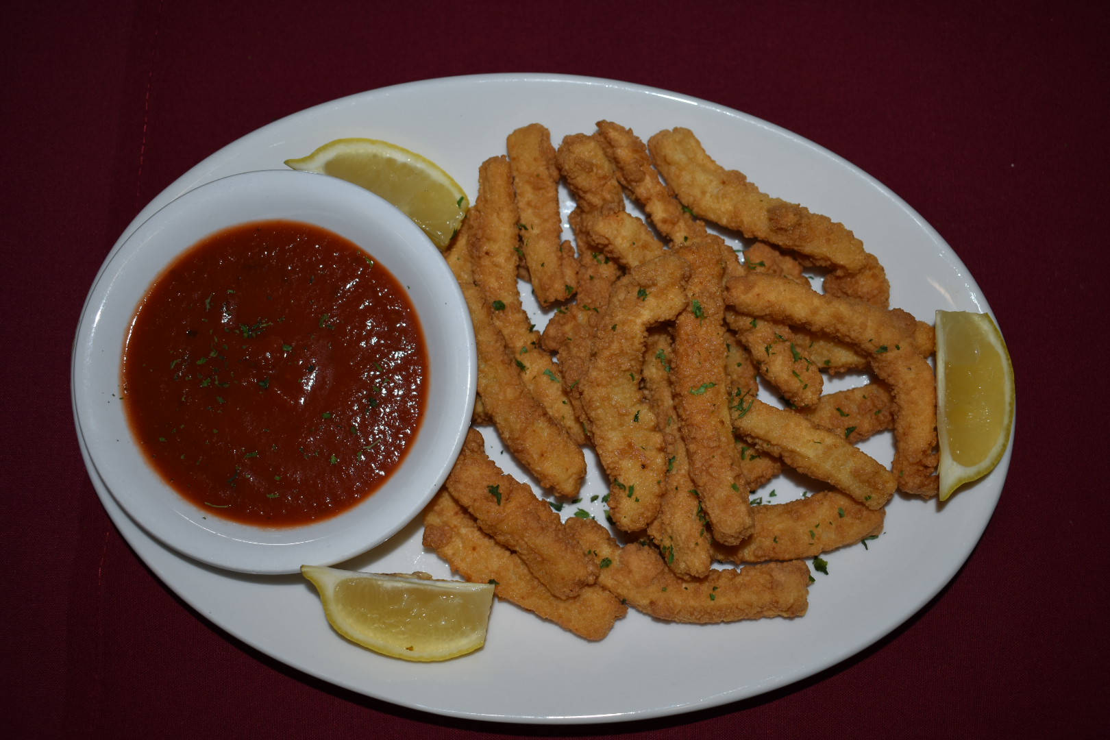 Order Fried Calamari food online from Como's No 1 Italian Restaurant store, El Paso on bringmethat.com