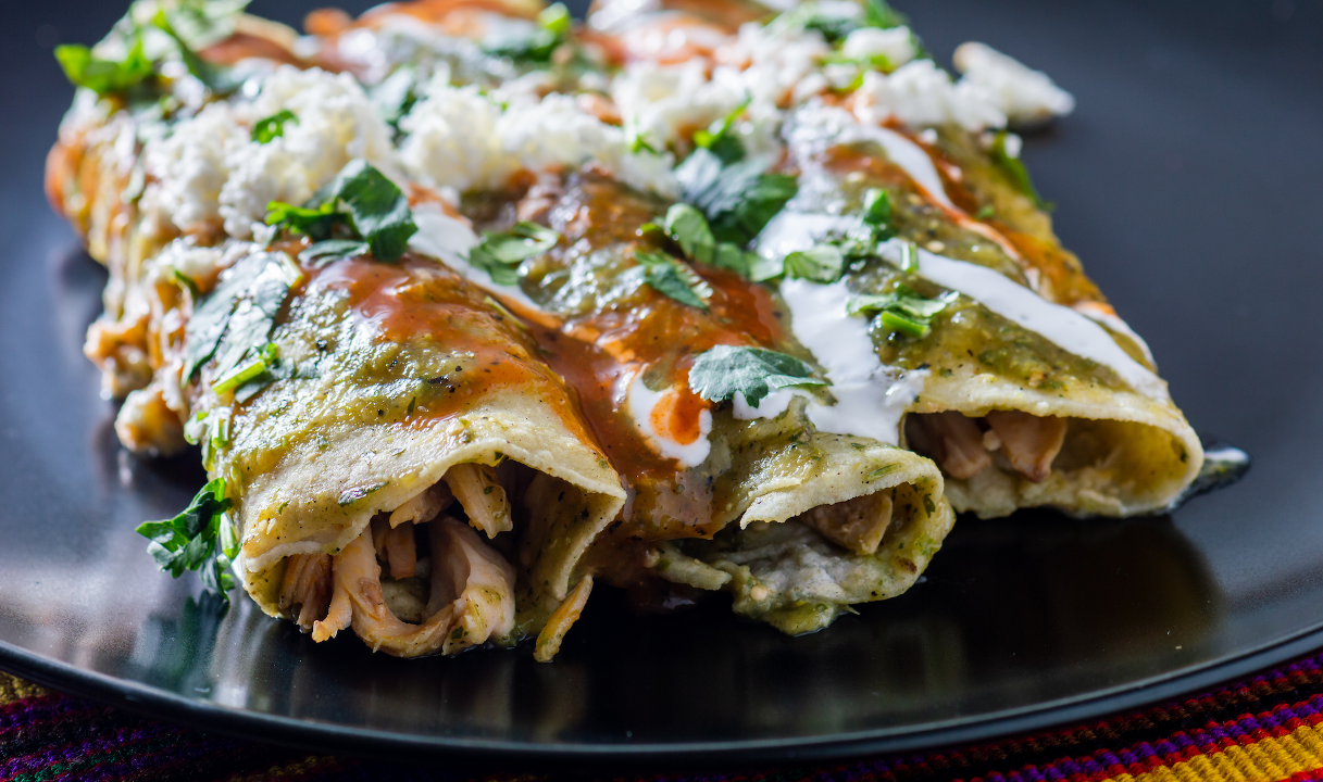 Order Any 3 Enchiladas with Rice and Beans food online from Oaxaca Taqueria store, Brooklyn on bringmethat.com