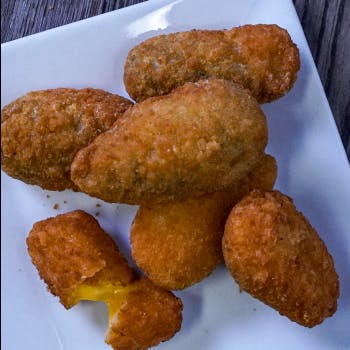 Order Jalapeno Poppers - 6 Pieces food online from Foxs Pizza Den store, Kittanning on bringmethat.com