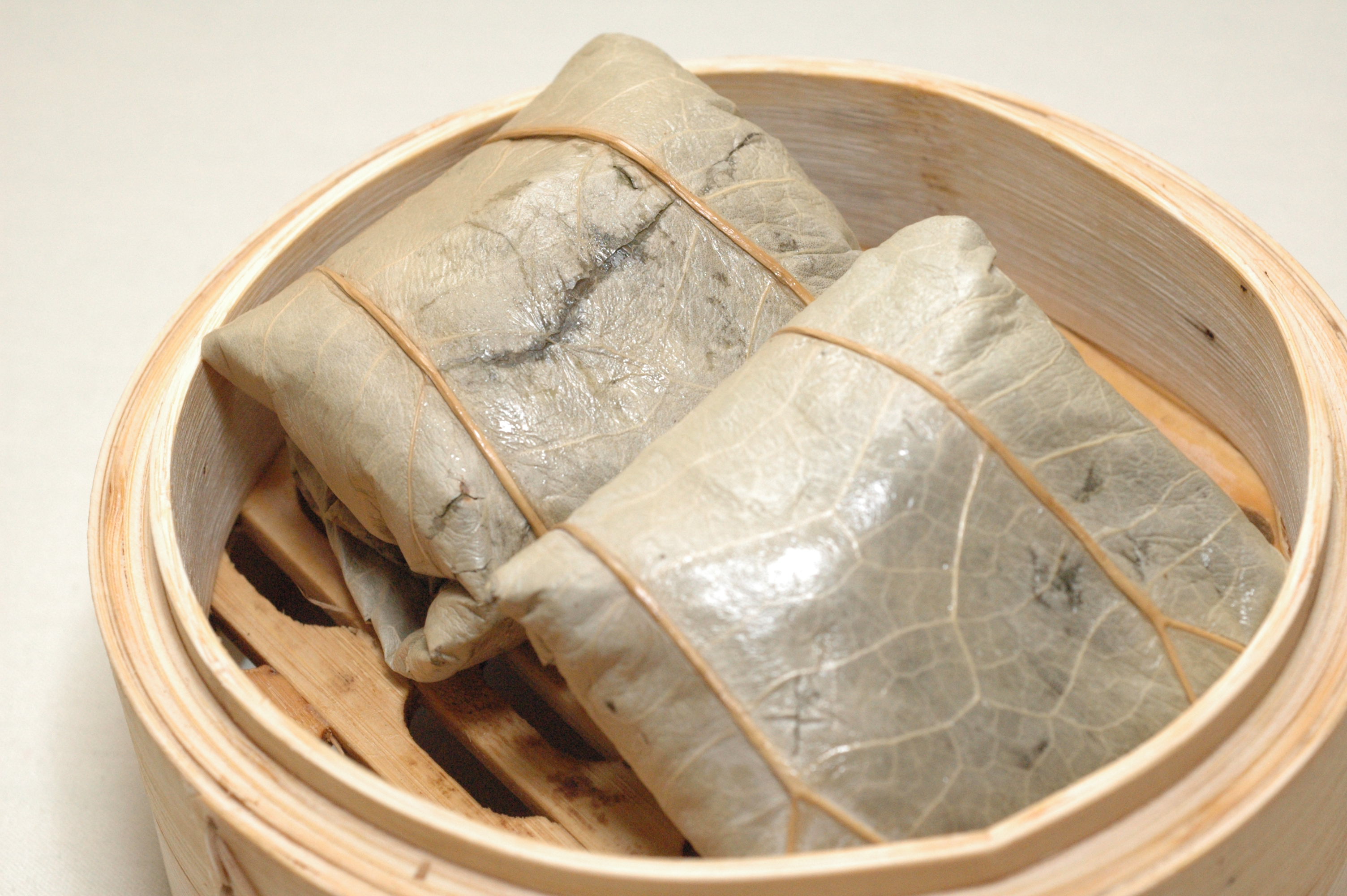 Order Sticky Rice In Lotus Leaf food online from Asian Pearl store, Richmond on bringmethat.com