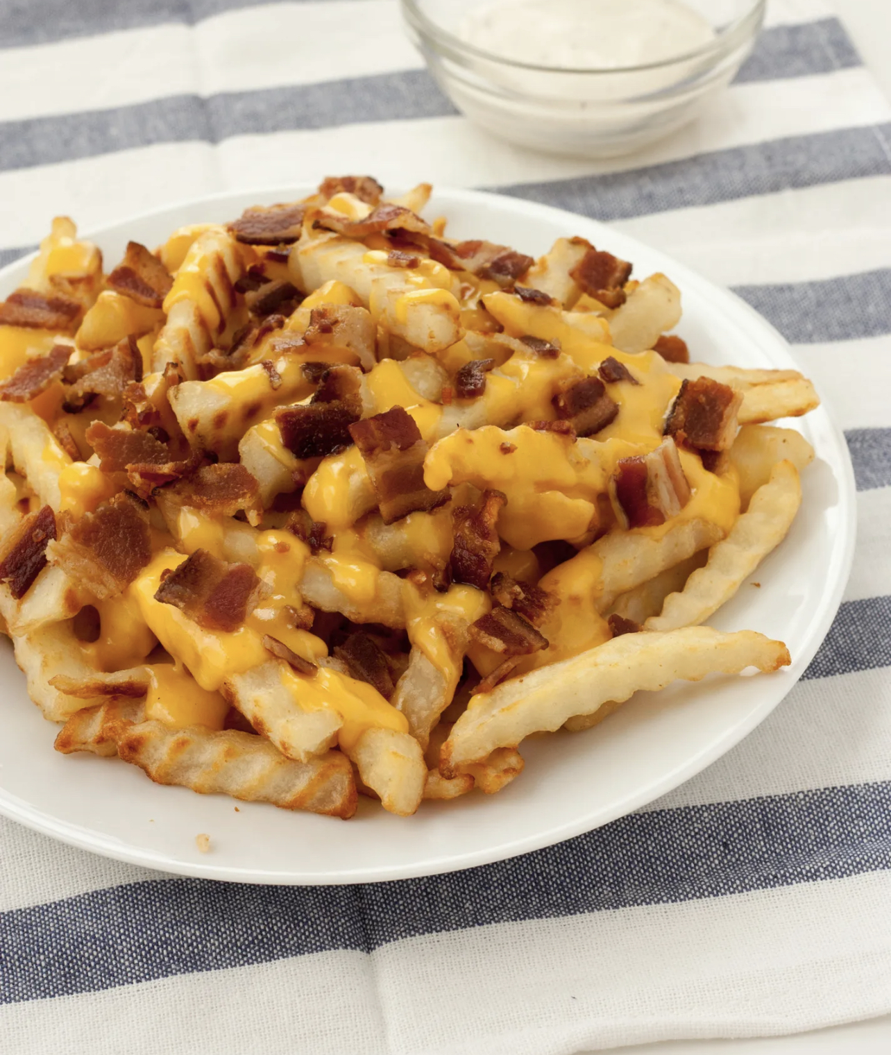 Order Bacon queso papas/ bacon cheese fries  food online from Luisa Restaurants store, Hazleton on bringmethat.com