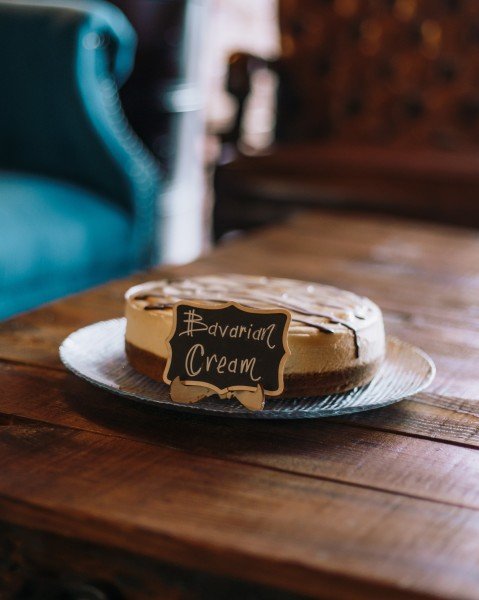 Order Bavarian Cream Cheesecake food online from Brew House Coffee & Bake Shop store, Maumee on bringmethat.com