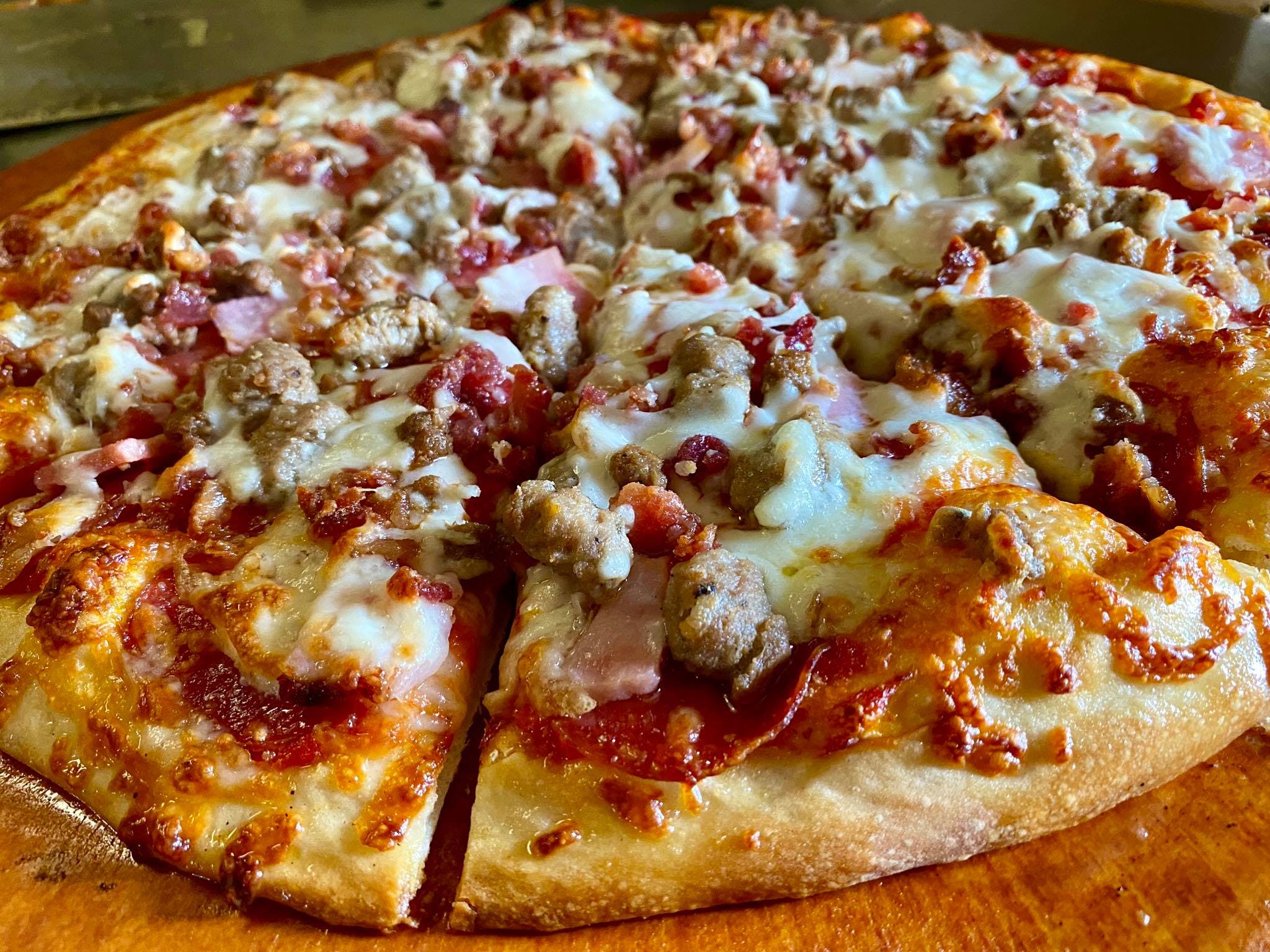 Order Meat Lovers Pizza - Small 10'' food online from Ellie's Pizza store, Beverly Farms on bringmethat.com