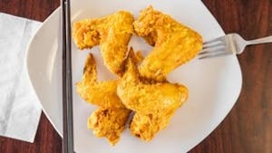 Order E. Garlic Fried Chicken Wings (10) 鱼香鸡翅 food online from He Rui store, Oklahoma City on bringmethat.com