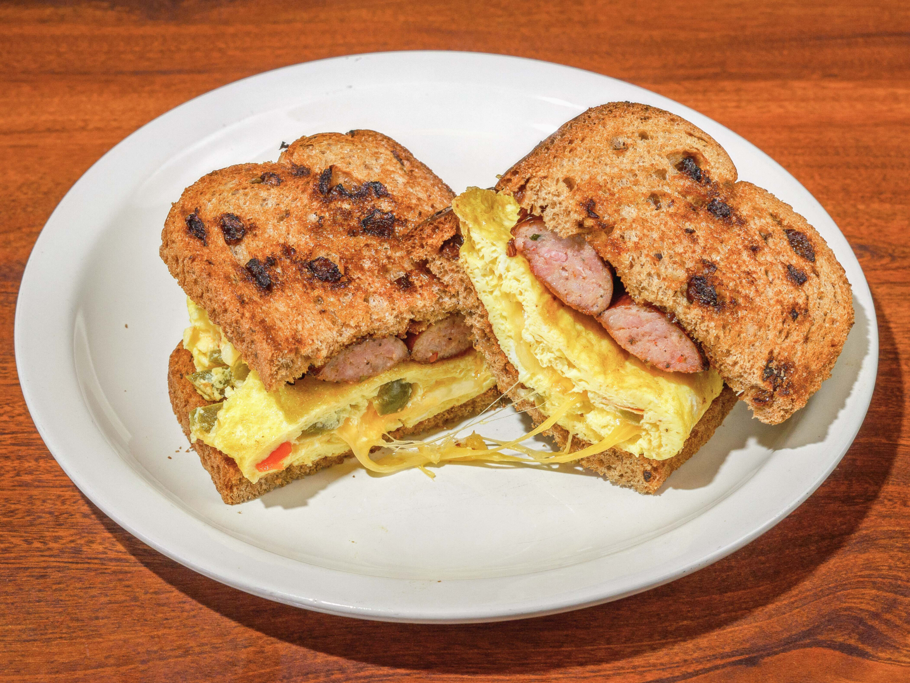 Order Adam’s Breakfast Sandwich food online from Bacon's Bistro and Cafe store, Hurst on bringmethat.com