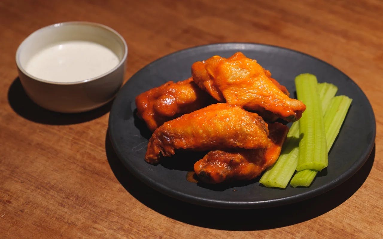 Order Buffalo Wings - 6 Pieces food online from Sunset Squares Slice Shop store, San Francisco on bringmethat.com