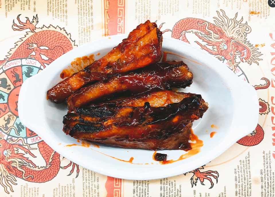 Order 106. BBQ Ribs food online from Ings Palace store, Burbank on bringmethat.com