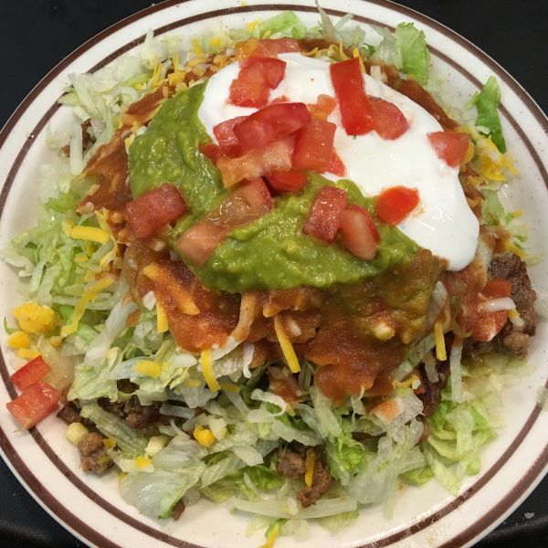 Order Meat Tostada food online from Tio's Mexican Food - Day Creek store, Rancho Cucamonga on bringmethat.com