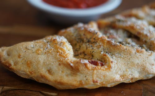 Order Classic Meat Calzone - Calzone food online from zpizza store, Mission Viejo on bringmethat.com