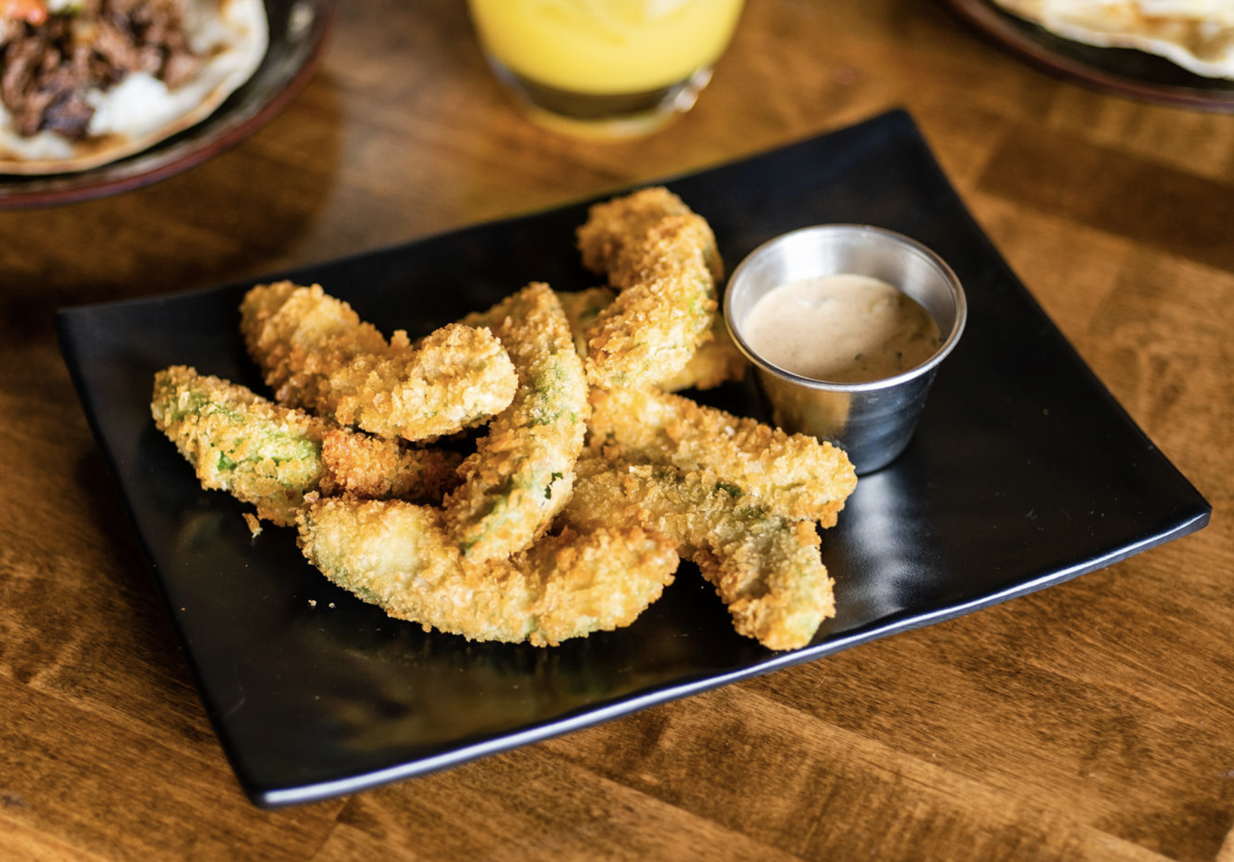 Order Avocado Fries food online from Nola Bar & Kitchen store, Chicago on bringmethat.com