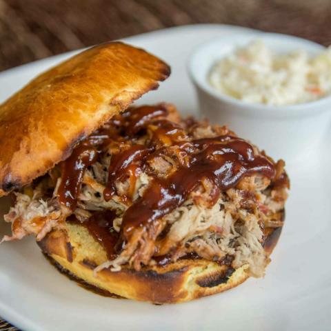 Order BBQ Pulled Pork Sandwich food online from Happy Hour Heaven store, Baltimore on bringmethat.com