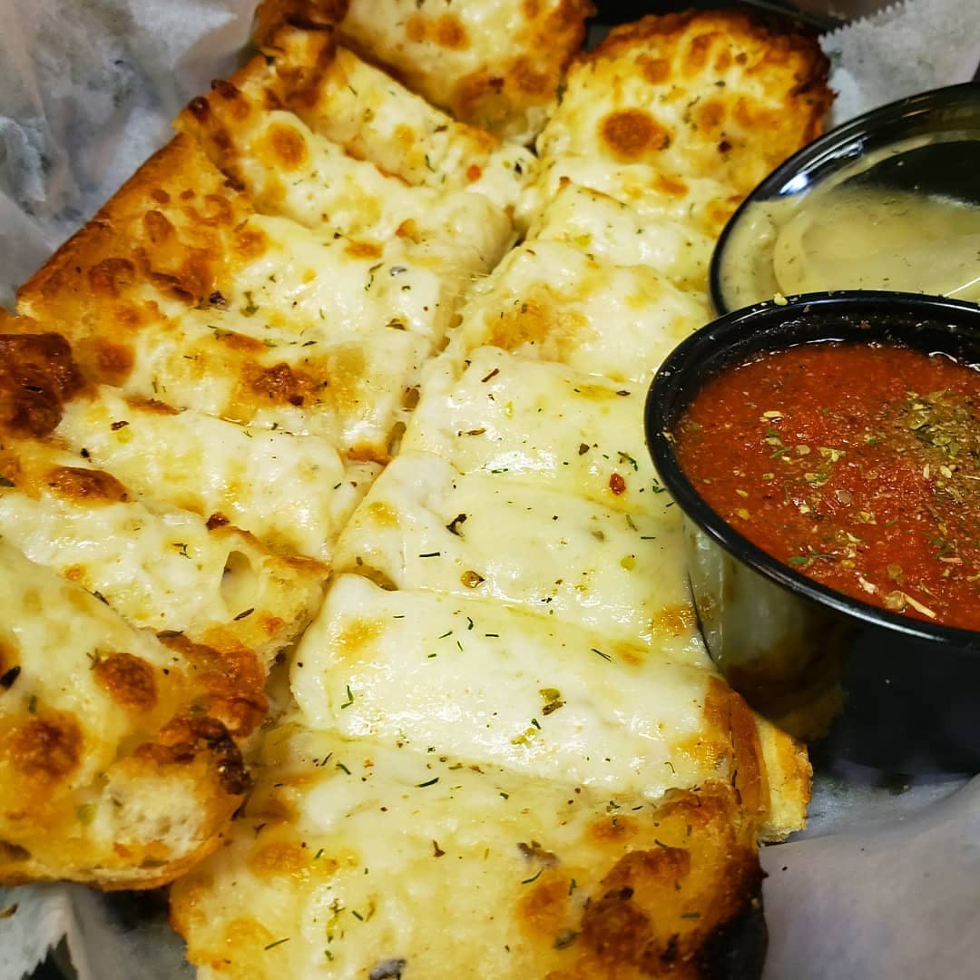 Order Cheese Bread - Appetizer food online from Holiday Pizza store, Statesboro on bringmethat.com