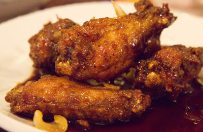Order Hot Braised Chicken Wing (12) food online from Peking Chinese Restaurant store, Suwanee on bringmethat.com