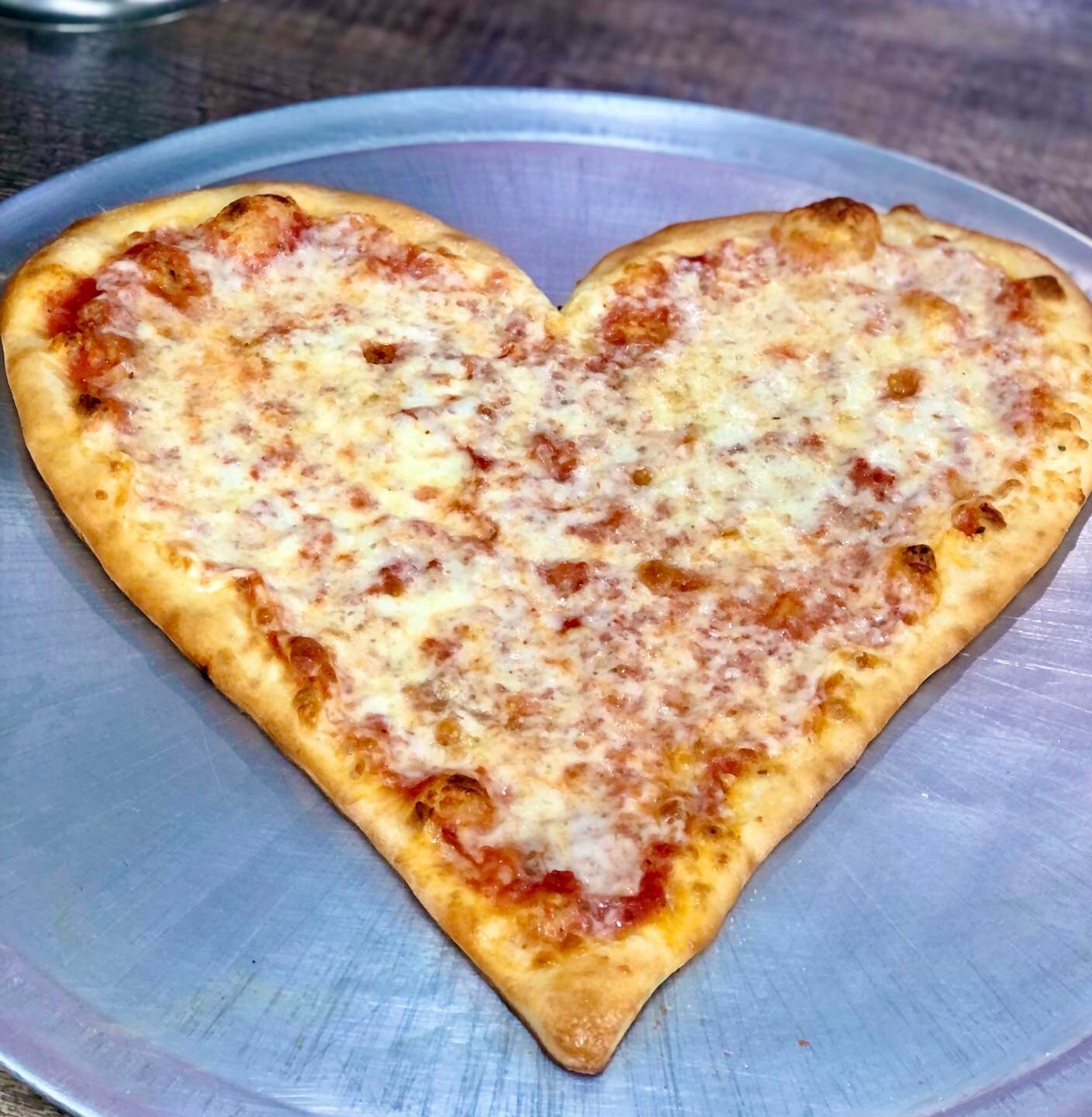 Order Heart shaped pizza food online from Rubens Pizza store, Ewing Township on bringmethat.com