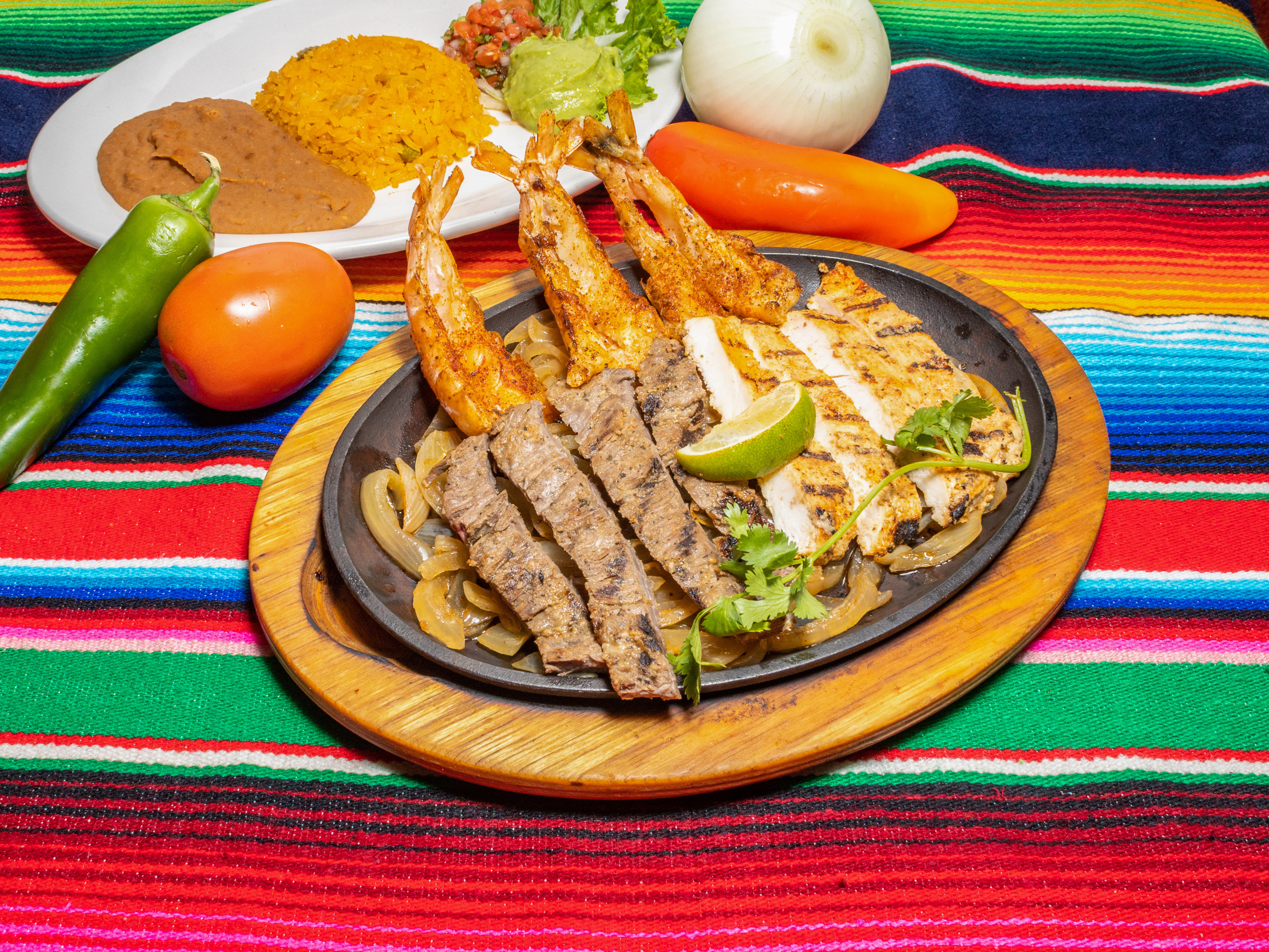 Order Triple Combo de Fabiola Fajitas food online from La Casa Agave Mexican Grill store, Pinehurst on bringmethat.com