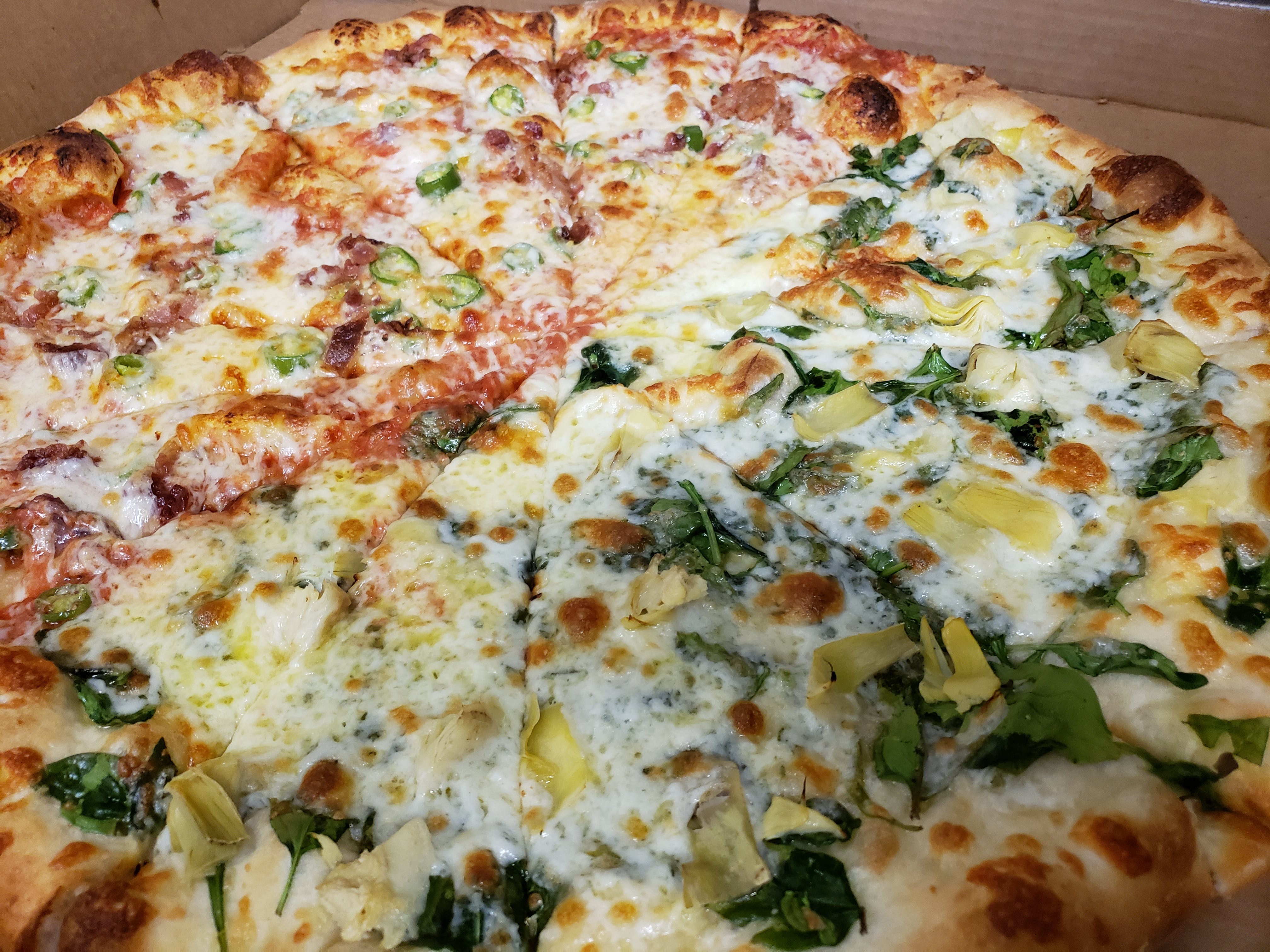 Order Artichoke Joe Pizza - Medium 12'' (Serves 2 People) food online from NYP Slice House store, Las Cruces on bringmethat.com