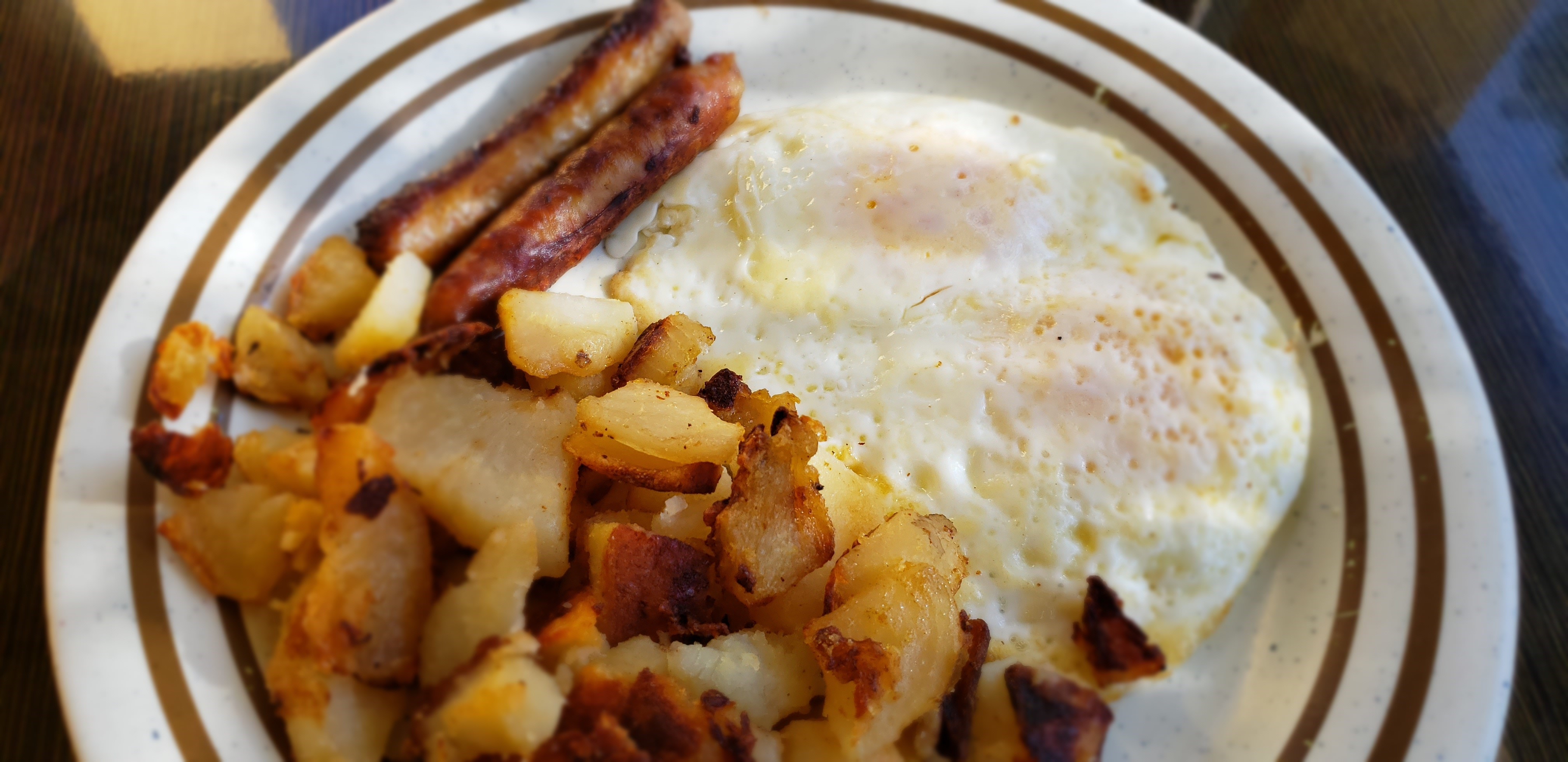 Order Special- 2 Eggs with 2 Sausage food online from Breakfast Cafe store, Oak Park on bringmethat.com