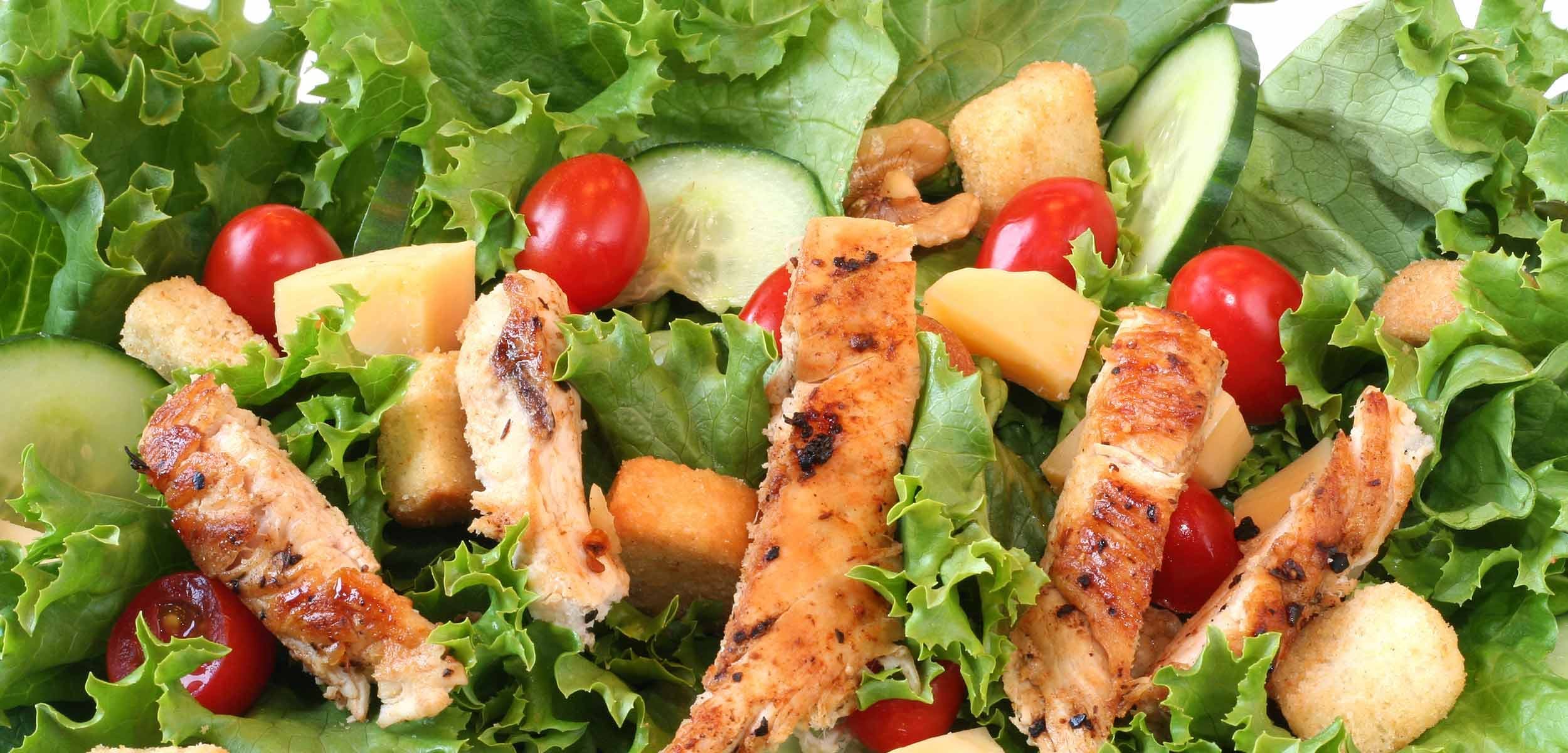 Order Grilled Chicken Caesar Salad - Salad food online from Father & Sons store, Woodbury on bringmethat.com