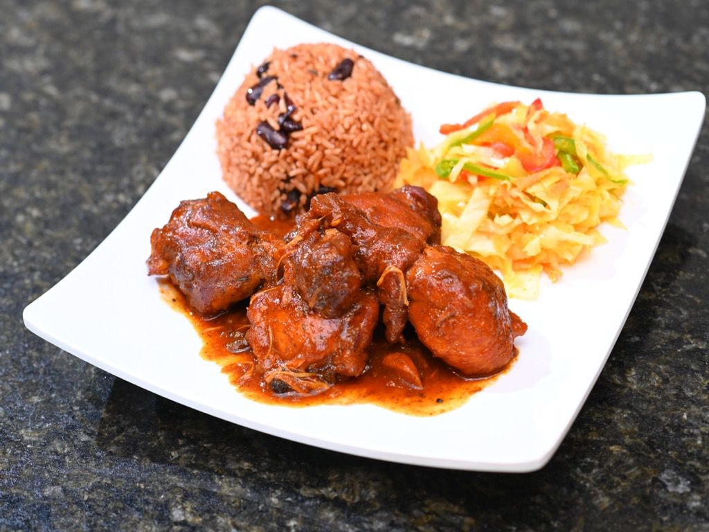 Order Brown Stew Chicken food online from Cafe 214 store, Addison on bringmethat.com