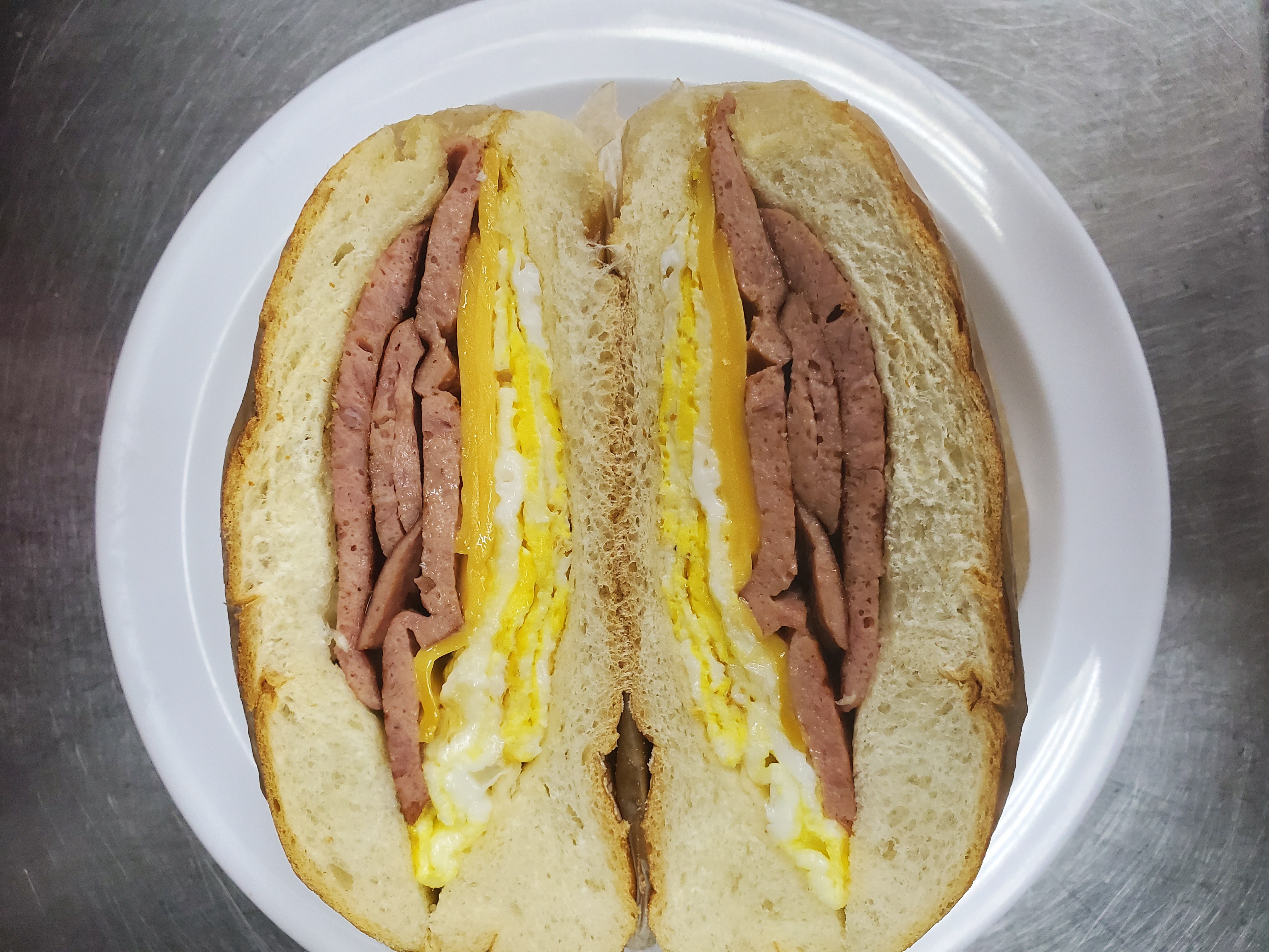 Order turkey sausage egg & cheese roll food online from Aminas Cafe store, Bronx on bringmethat.com