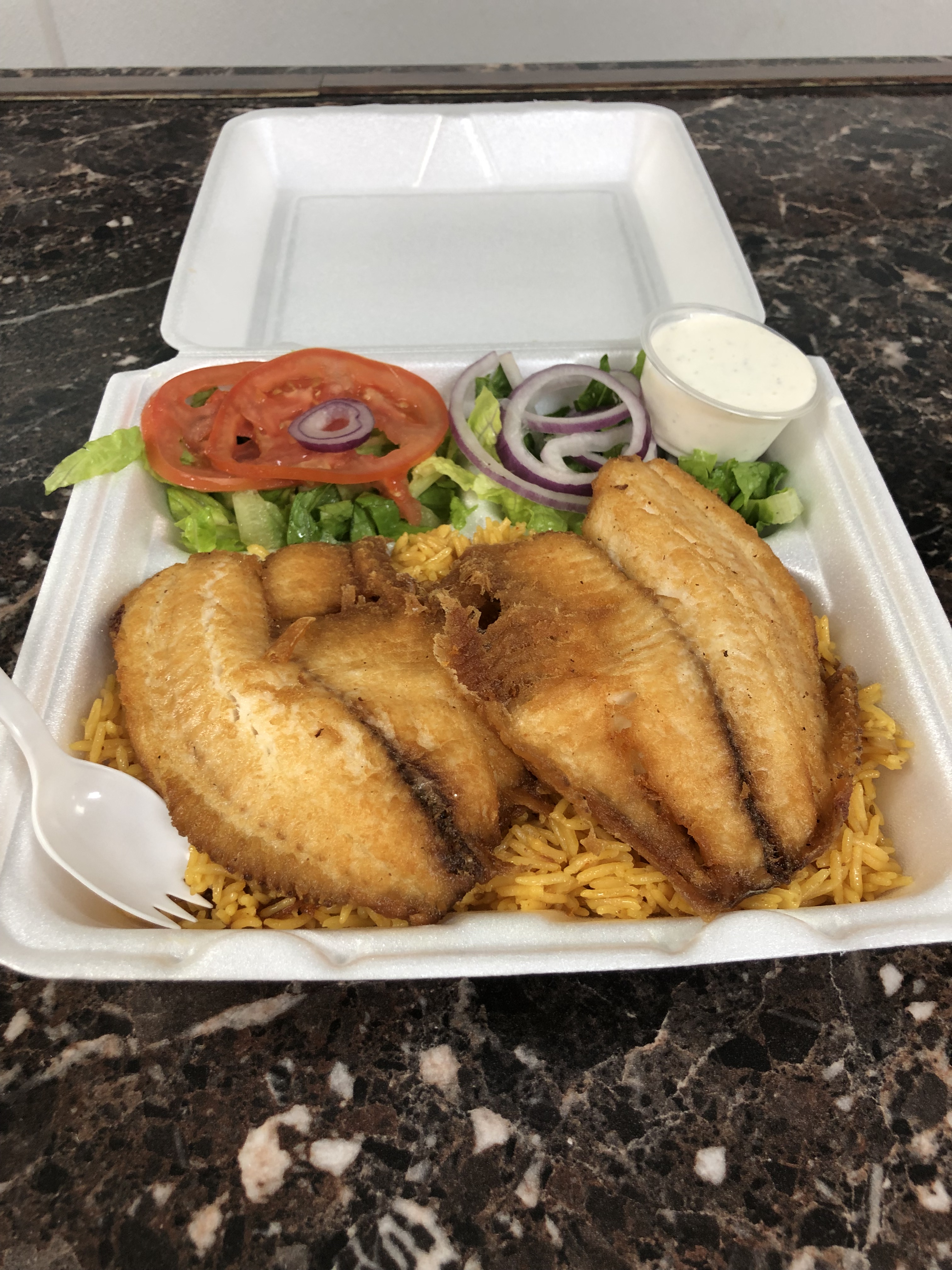 Order 2 tilapia fish over rice food online from Rice N Spice store, Lodi on bringmethat.com