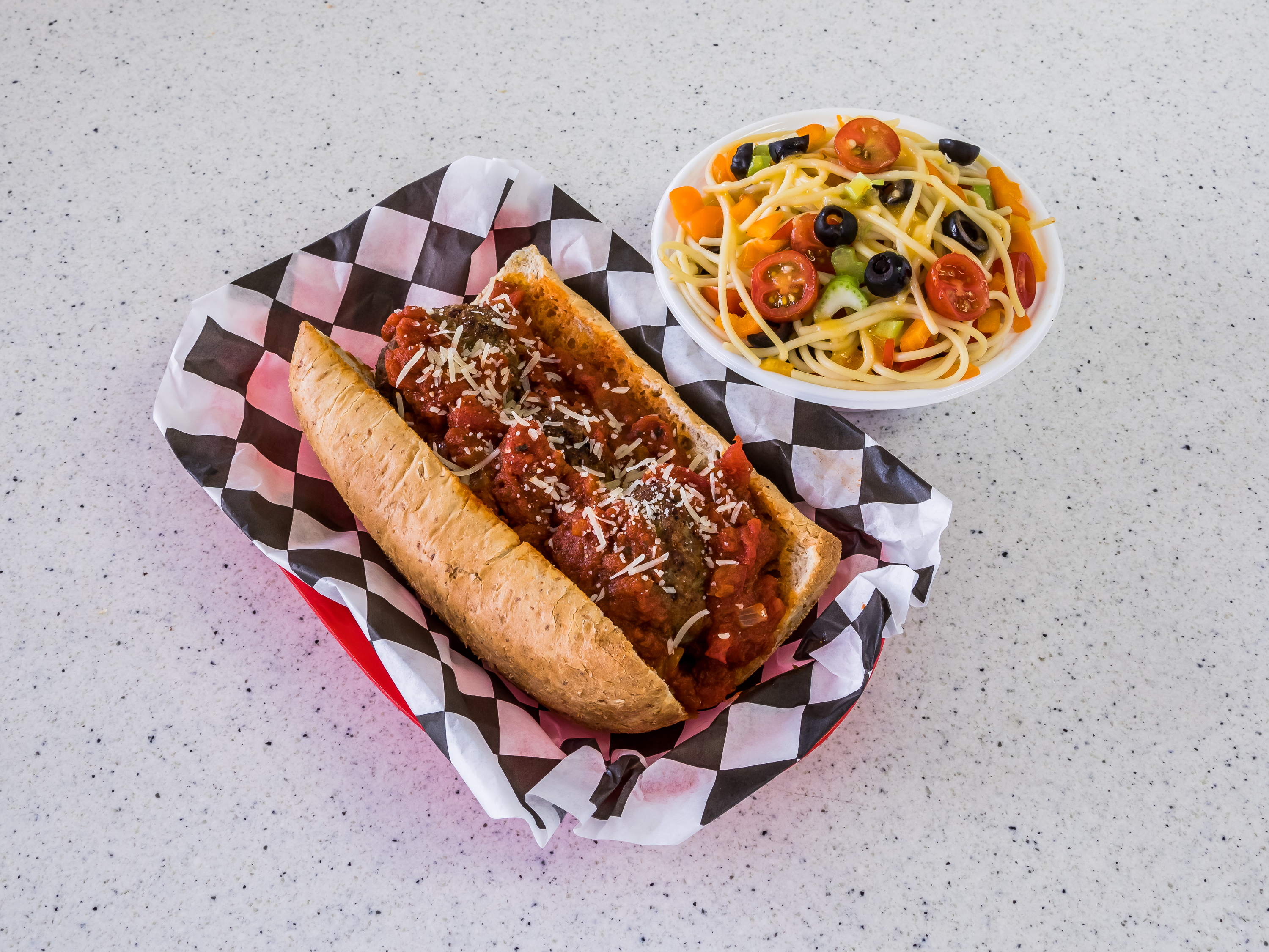 Order 10. Meatball Sub with Salad food online from Home Town Dining store, Phoenix on bringmethat.com