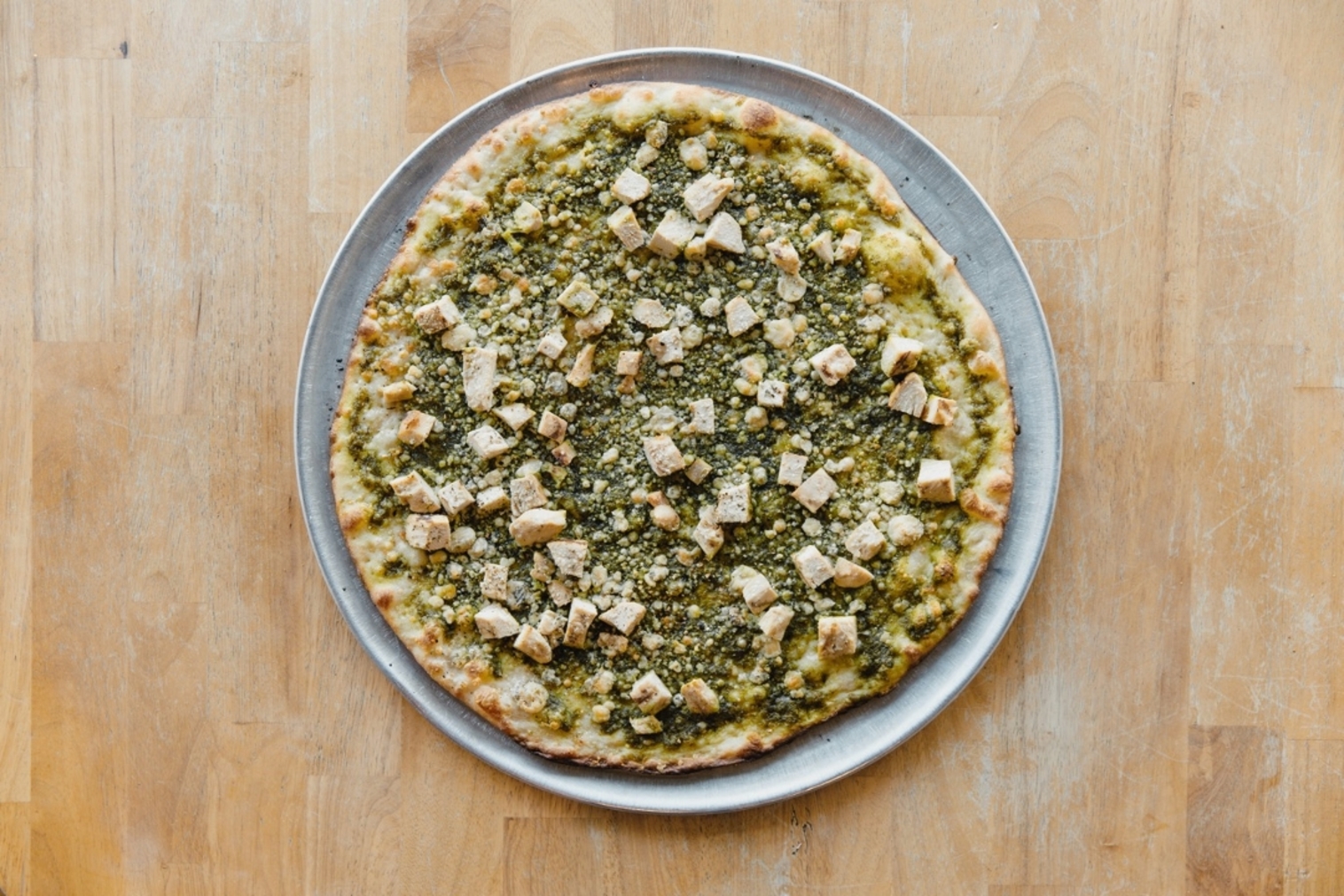 Order 18" Wicked Pesto food online from The Upper Crust Pizzeria store, Brookline on bringmethat.com