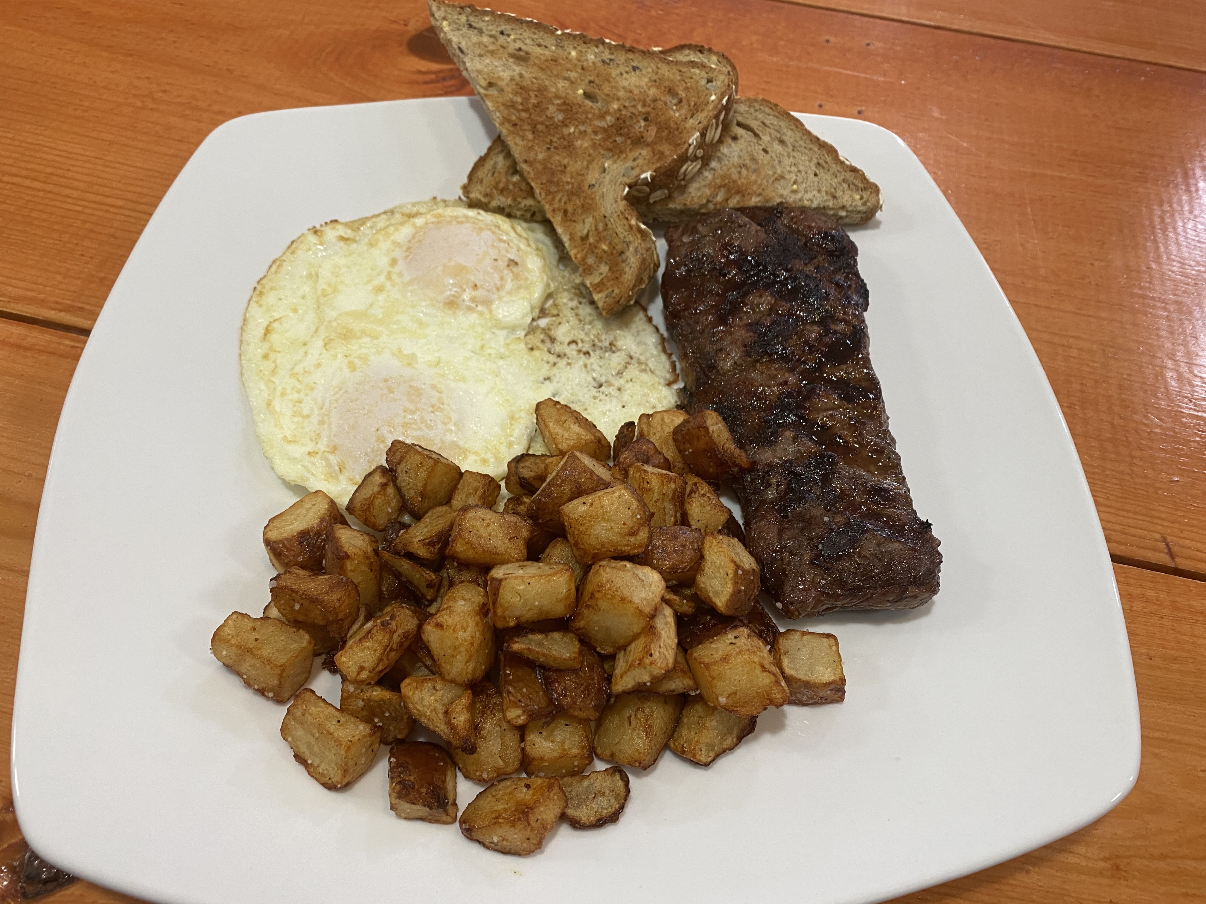Order STEAK AND EGGS food online from Thiago's Restaurant store, Chicago on bringmethat.com