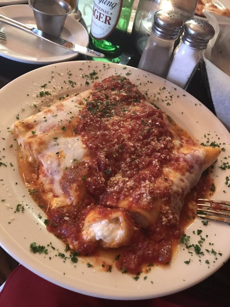 Order Manicotti - Dinner food online from Ducatis Pizzeria & Trattoria store, Myrtle Beach on bringmethat.com