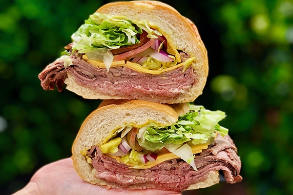 Order Reg Beef Deluxe food online from Mickey Deli store, Hermosa Beach on bringmethat.com