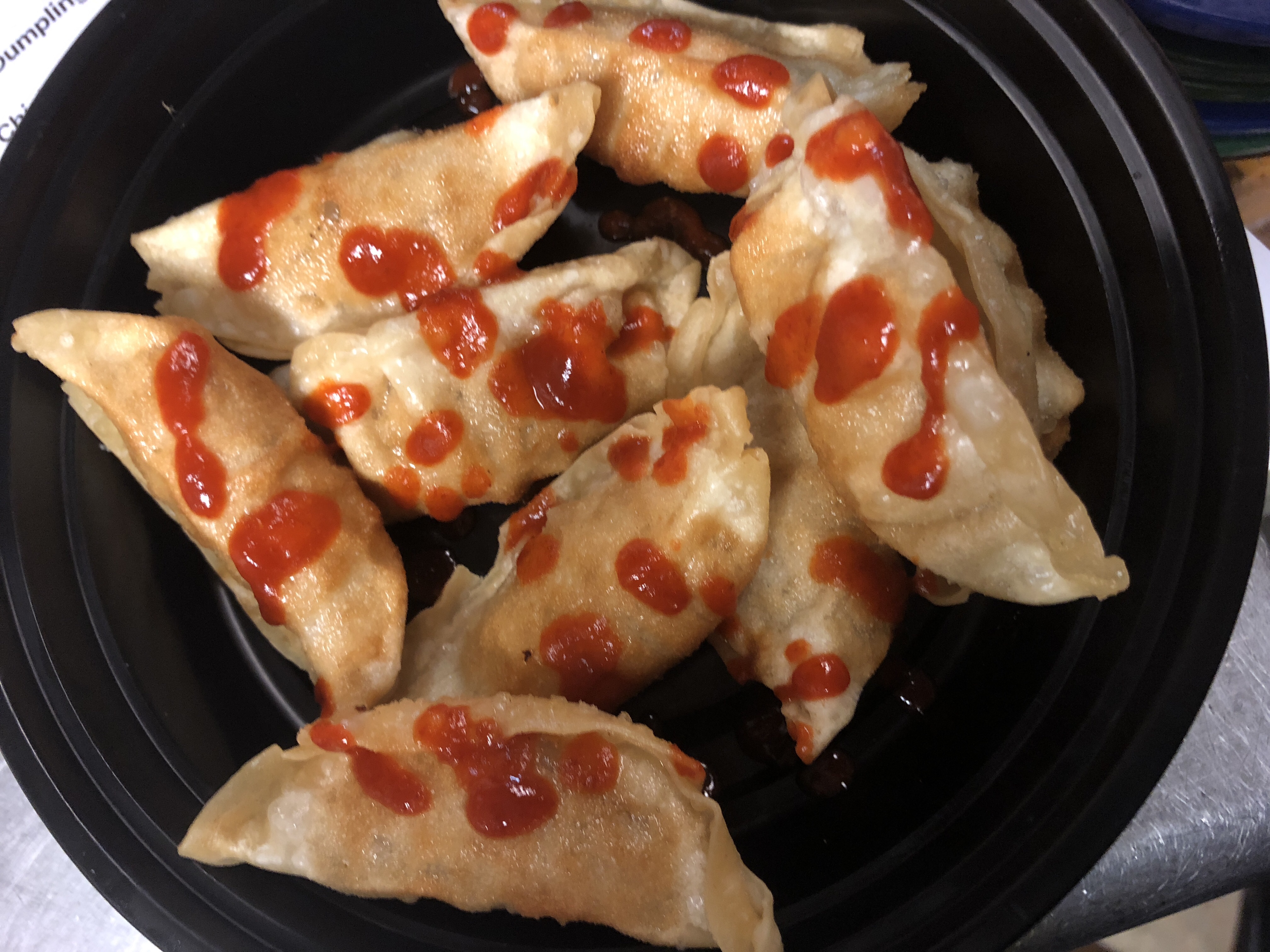 Order Hot&chili Sriracha Dumplings food online from China Joy Restaurant store, Jacksonville on bringmethat.com