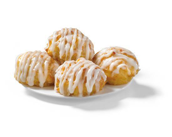 Order 4 Frosted Honey-Butter Biscuits food online from Church's Chicken store, Chamblee on bringmethat.com