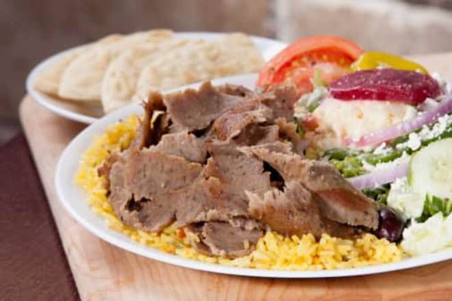 Order Gyro Meat with Rice & Greek Salad Dinner food online from Little Greek store, Westchase on bringmethat.com