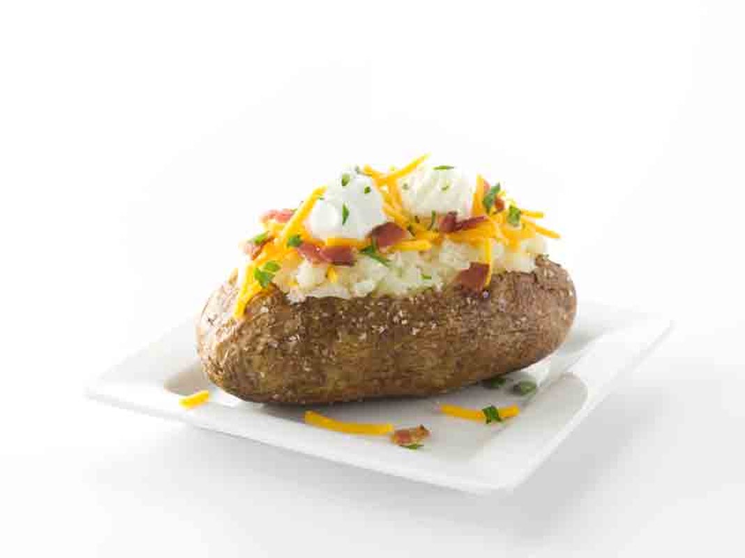 Order Loaded Baked Potato food online from Ruby Tuesday store, Indianapolis on bringmethat.com