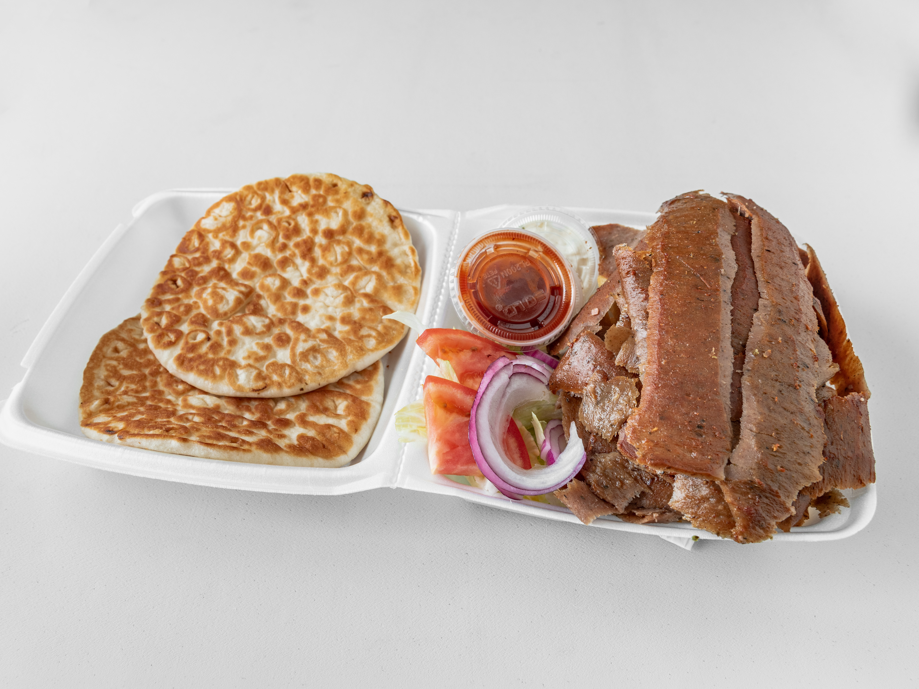 Order Gyro Plate Dinner food online from Truth Ribzzz & More store, Chicago on bringmethat.com