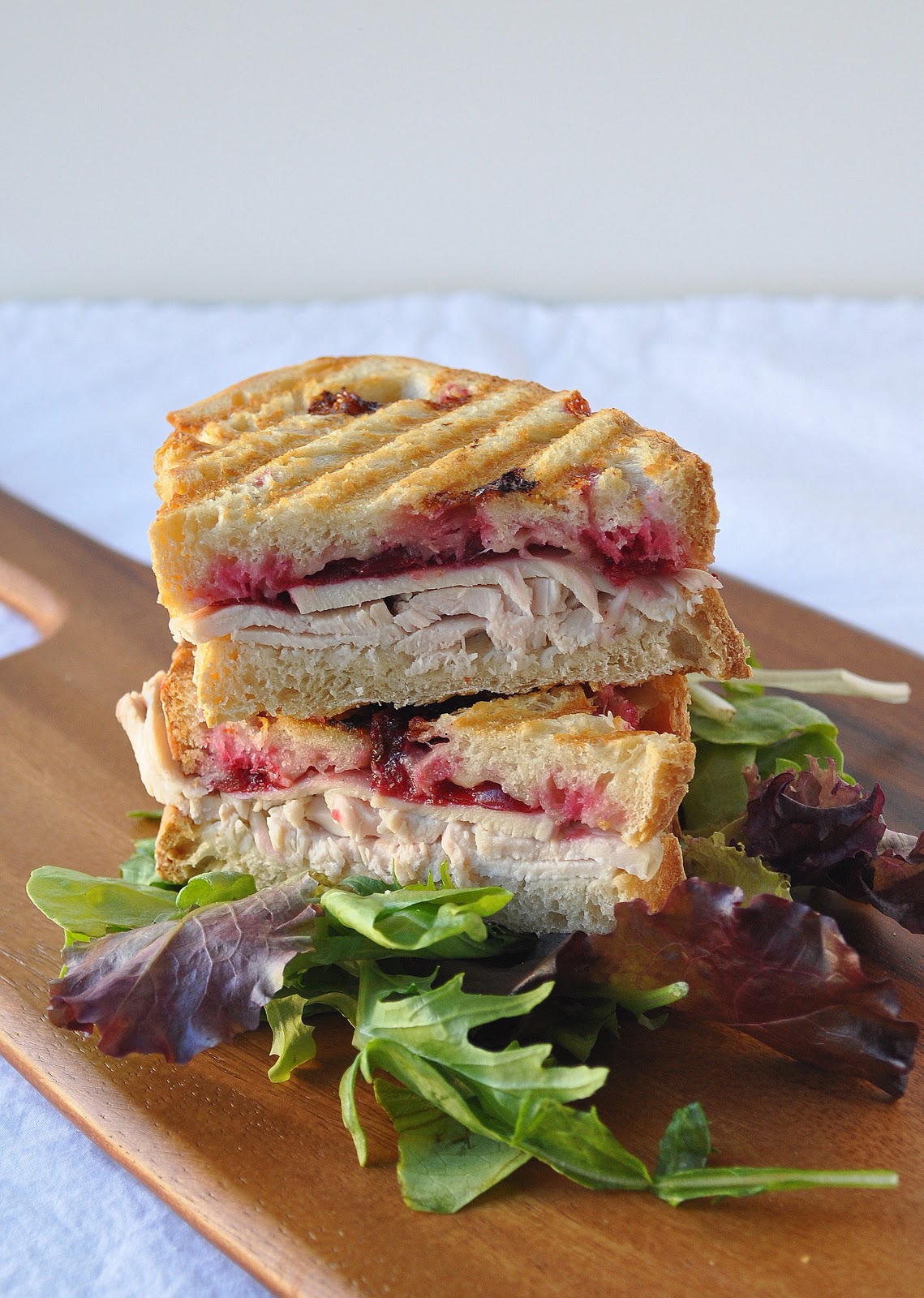 Order Cranberry Turkey Panini food online from Murphy's Deli Tanglewood store, Houston on bringmethat.com