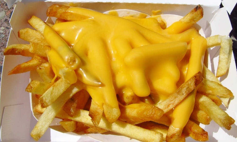 Order Cheddar Cheese Fries - Fries food online from Lorenzo's Pizza store, Fountain Hill on bringmethat.com
