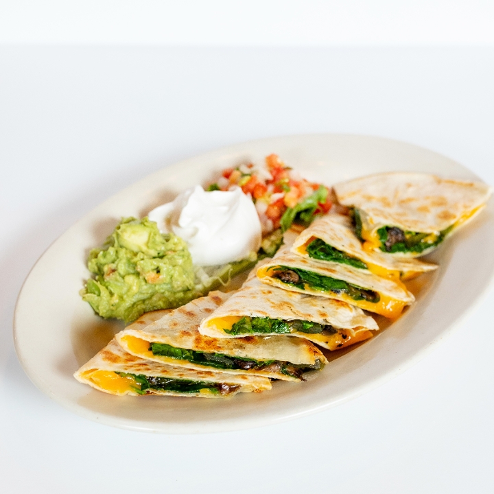 Order Veggie Quesadilla food online from El Fenix Mexican Restaurant store, Greenville on bringmethat.com