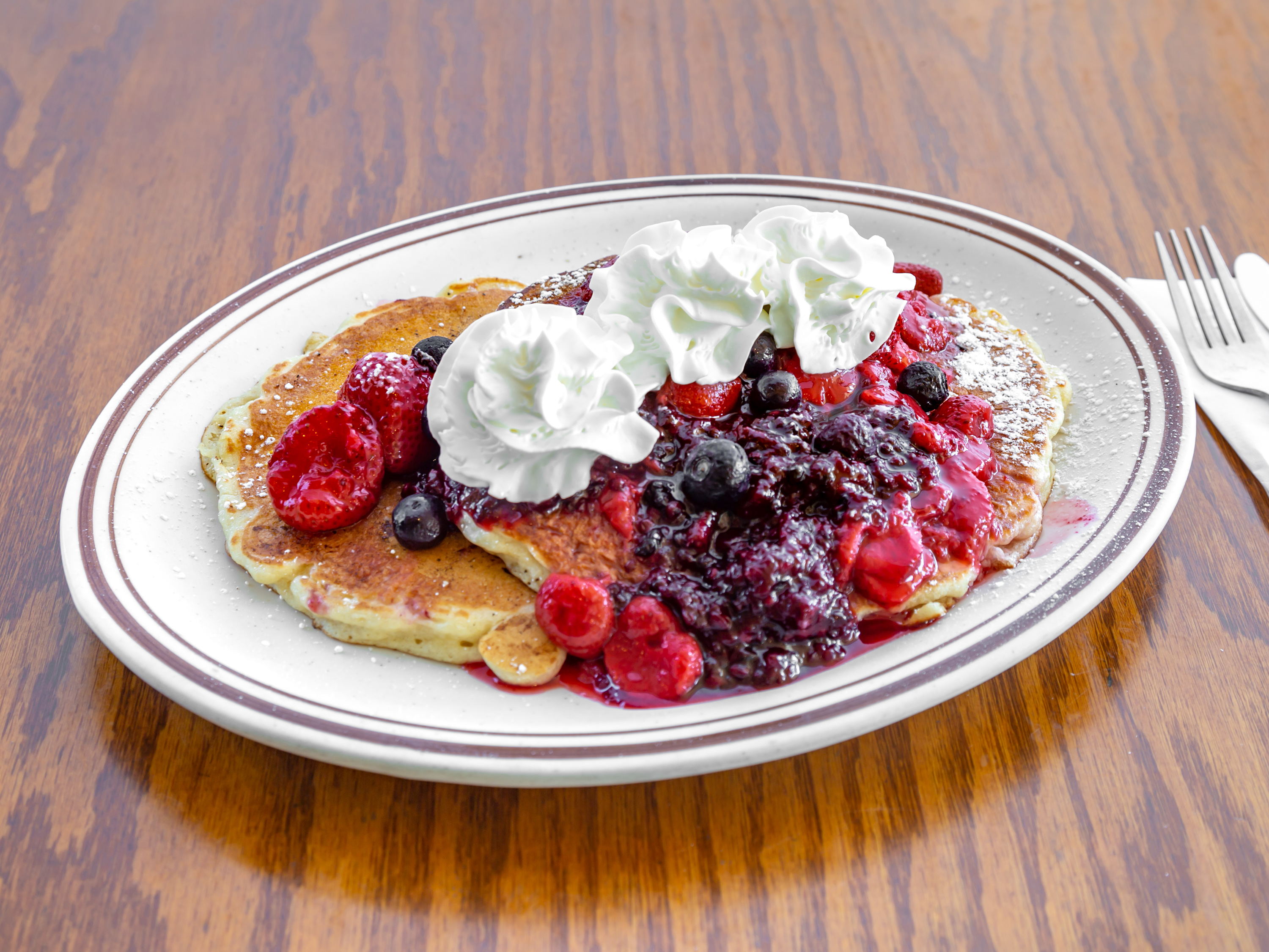 Order 2 Very Berry Pancakes food online from Sweetie Cafe & Catering store, Redding on bringmethat.com